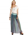 In a relaxed wide leg, these Free People printed & pleated pants are a modern take on boho appeal!