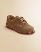 Classic dirty bucks keep their good looks all through the school week - and weekends, too! Adjustable laces Padded insole Red rubber traction sole Sueded leather ImportedPlease note: It is recommended that you order ½ size smaller than measured. If your child measures a size 7.0, you may want to order a 6½. 