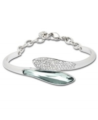 Balancing act. Based on a yin yang approach, Swarovski's Genuine crystal bangle bracelet features a light Azore crystal moving toward its clear pavé crystals on top. Crafted in silver tone mixed metal, it's an intriguingly interconnected design that's sure to stand out in your jewelry collection. Approximate diameter: 3 inches. Balancing act. Based on a yin yang approach, Swarovski's Genuine crystal bangle bracelet features a light Azore crystal moving toward its clear pavé crystals on top. Crafted in silver tone mixed metal, it's an intriguingly interconnected design that's sure to stand out in your jewelry collection. Approximate diameter: 3 inches.