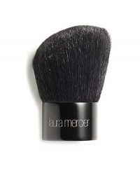 A black goat hair, kabuki-style brush with severely rounded edges and a gently cut angled head allowing for fuller coverage on the planes of the face. Ideally used with the Mineral Powder SPF 15 as well as other powder formulations. Pick up powder on the slanted face, tap off excess and buff into the skin. A black goat hair, kabuki-style brush with severely rounded edges and a gently cut angled head allowing for fuller coverage on the planes of the face. Ideally used with the Mineral Powder SPF 15 as well as other powder formulations. Pick up powder on the slanted face, tap off excess and buff into the skin.