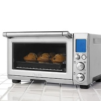 This clever multifunctional oven may take over many everyday cooking tasks from your traditional oven - and maybe more. It has nine common functions accessible through a simple digital interface, and its Element IQ internal-sensor technology automatically adjusts power and calculates cooking time. With temperature converter, frozen foods defrost button, nonstick interior and stainless steel housing. This clever multifunctional oven may take over many everyday cooking tasks from your traditional oven - and maybe more. It has nine common functions accessible through a simple digital interface, and its Element IQ internal-sensor technology automatically adjusts power and calculates cooking time. With temperature converter, frozen foods defrost button, nonstick interior and stainless steel housing.