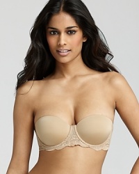 Calvin Klein Underwear seductive comfort lace basic strapless bra. Floral detail at front and side bands. Removable adjustable straps with hook and eye closure. Push up. Smooth contoured shape. Style #U1143 Calvin Klein Underwear seductive comfort lace basic strapless bra. Floral detail at front and side bands. Removable adjustable straps with hook and eye closure. Push up. Smooth contoured shape. Style #U1143