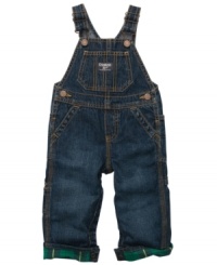 Denim Osh Kosh overalls with flannel lining are built with lots of pockets, authentic hardware, and classic vest back for long wearing fun. Denim Osh Kosh overalls with flannel lining are built with lots of pockets, authentic hardware, and classic vest back for long wearing fun.