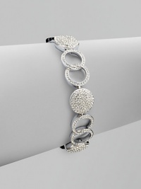 A gorgeous piece featuring circles and links accented with brilliant pavé crystals. CrystalsRhodium-plated brassLength, about 7¼ Tongue-and-box closureImported A gorgeous piece featuring circles and links accented with brilliant pavé crystals. CrystalsRhodium-plated brassLength, about 7¼ Tongue-and-box closureImported