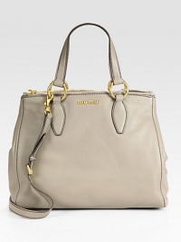 Vitello caribou calfskin design in a top-zip carryall with metal logo detail.Double top handles, 6¾ dropDetachable adjustable shoulder strap, 19¾-22 dropDouble top-zip compartmentsMetal letter logo detailProtective metal feetOne inside zip pocketOne inside open pocketCotton/satin lining13½W X 11H X 4¼DMade in Italy Vitello caribou calfskin design in a top-zip carryall with metal logo detail.Double top handles, 6¾ dropDetachable adjustable shoulder strap, 19¾-22 dropDouble top-zip compartmentsMetal letter logo detailProtective metal feetOne inside zip pocketOne inside open pocketCotton/satin lining13½W X 11H X 4¼DMade in Italy