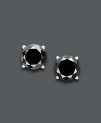 Dynamic diamond earrings that make a statement. Round-cut black diamonds (1-1/2 ct. t.w.) create a stunning silhouette against a 14k white gold post setting. Approximate diameter: 1/6 inch. Dynamic diamond earrings that make a statement. Round-cut black diamonds (1-1/2 ct. t.w.) create a stunning silhouette against a 14k white gold post setting. Approximate diameter: 1/6 inch.