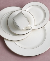 Subtle accents meet traditional sophistication to produce a timeless collection of fine china. The salad plate features an elegant raised, white-dot pattern with platinum trim.