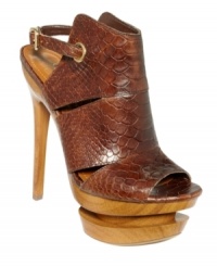 Legs for days. A chunky wooden platform and towering heel amp up these sleek Jessica Simpson shooties, while a cut-out pattern and hot ankle strap add intrigue. Legs for days. A chunky wooden platform and towering heel amp up these sleek Jessica Simpson shooties, while a cut-out pattern and hot ankle strap add intrigue.