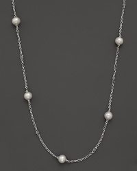 Delicate pearls sit on a sterling silver chain on this timeless Lagos necklace. Delicate pearls sit on a sterling silver chain on this timeless Lagos necklace.