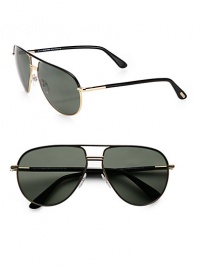 Must-have aviator frames crafted in lightweight metal with tubular temples. Available in black-gold with polarized green lens.Tubular temples100% UV protectionMade in Italy Must-have aviator frames crafted in lightweight metal with tubular temples. Available in black-gold with polarized green lens.Tubular temples100% UV protectionMade in Italy