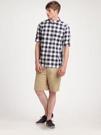 Easy summer style is a breeze in this versatile, button-front style shaped in a rich cotton and linen blend with button tabs on sleeve for rolling.Button-frontChest patch pocketRoll tabs on sleeve76% cotton/24% linenMachine washImported Easy summer style is a breeze in this versatile, button-front style shaped in a rich cotton and linen blend with button tabs on sleeve for rolling.Button-frontChest patch pocketRoll tabs on sleeve76% cotton/24% linenMachine washImported