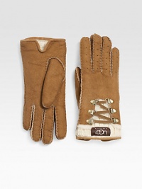 A tactile style with contrast knit trim and pretty lace up details. Dyed sheepskin shearlingAbout 9 longTrim: 80% wool/20% nylonSpecialist dry cleanImportedFur origin: Spain A tactile style with contrast knit trim and pretty lace up details. Dyed sheepskin shearlingAbout 9 longTrim: 80% wool/20% nylonSpecialist dry cleanImportedFur origin: Spain