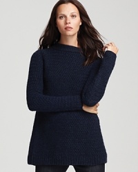 An unexpected back vent lends unique flair to this sumptuous Theory sweater--a must-have for off-hours chic and an instant lift to love-worn jeans. An unexpected back vent lends unique flair to this sumptuous Theory sweater--a must-have for off-hours chic and an instant lift to love-worn jeans.
