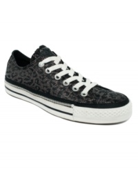 Not your average kicks. The Chuck Taylor All-Star Ox Zip Rand sneakers by Converse feature a sparkly pattern all over the upper and zipper detail around the sole. Not your average kicks. The Chuck Taylor All-Star Ox Zip Rand sneakers by Converse feature a sparkly pattern all over the upper and zipper detail around the sole.