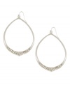 Polish your look with chic drop earrings. Jessica Simpson's head-turning earrings feature smooth silver tone mixed metal earrings dusted with sparkling crystal accents. Approximate drop: 3 inches. Approximate diameter: 1-1/2 inches.