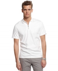 Streamline your style with this modern half-zip polo shirt from Calvin Klein. Streamline your style with this modern half-zip polo shirt from Calvin Klein.