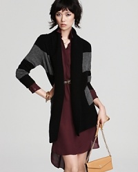 Oversized stripes embolden a cashmere C by Bloomingdale's cardigan, finished with a generous shawl collar for a cozy yet chic approach to layering. Oversized stripes embolden a cashmere C by Bloomingdale's cardigan, finished with a generous shawl collar for a cozy yet chic approach to layering.