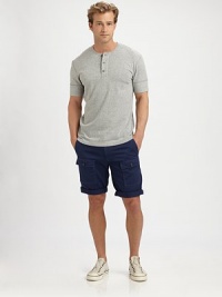 Soft, heathered slub knit gives this classic tee a relaxed edge, echoed in the bold reverse seaming.Crewneck pulloverThree-button placketShort sleeves50% cotton/50% polyesterMachine washImported