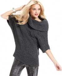 Get an on-trend textural look with this DKNY Jeans' sweater. With cable and metallic knit, it adds a chic touch to skinny jeans. Get an on-trend textural look with this DKNY Jeans' sweater. With cable and metallic knit, it adds a chic touch to skinny jeans.