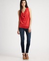 Super-soft cowlneck tank with a banded hem can be perfectly paired with skinny jeans or a fitted skirt. CowlneckSleevelessBanded hem95% rayon/5% spandexDry cleanMade in USAModel shown is 5'10 (177cm) wearing US size Small.
