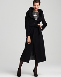 Embrace chilly temperatures in statement style with the flowing silhouette of this trend-right Calvin Klein Premium maxi coat. Embrace chilly temperatures in statement style with the flowing silhouette of this trend-right Calvin Klein Premium maxi coat.