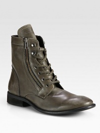 Remarkably soft leather style, with light distressing, lace-up and side-zip detail, this ankle boot exudes casual-cool.Leather upperLeather/fleece liningPadded insoleLeather soleImported Remarkably soft leather style, with light distressing, lace-up and side-zip detail, this ankle boot exudes casual-cool.Leather upperLeather/fleece liningPadded insoleLeather soleImported