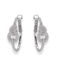 A stylish symbol. Representing love, friendship and unity, Swarovski's knot design remains a popular theme--as demonstrated by these elegant Nathalie earrings. Crafted in silver tone mixed metal, they're adorned with clear pavé crystals. Approximate diameter: 1-1/8 inches. A stylish symbol. Representing love, friendship and unity, Swarovski's knot design remains a popular theme--as demonstrated by these elegant Nathalie earrings. Crafted in silver tone mixed metal, they're adorned with clear pavé crystals. Approximate diameter: 1-1/8 inches.