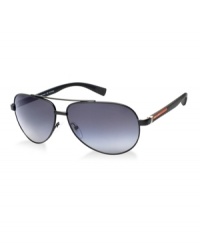 The high-performance distinctive Red Stripe logo of Prada Linea Rossa is a lifestyle sunwear collection created for the fashion-forward consumer. For those who wear sunglasses for competitive and noncompetitive sports and leisure, Prada Linea Rossa unites both active and leisure lifestyles in an eyewear collection, while holding fast to the unmistakable Prada style. The high-performance distinctive Red Stripe logo of Prada Linea Rossa is a lifestyle sunwear collection created for the fashion-forward consumer. For those who wear sunglasses for competitive and noncompetitive sports and leisure, Prada Linea Rossa unites both active and leisure lifestyles in an eyewear collection, while holding fast to the unmistakable Prada style.