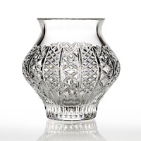Elegant and timeless, this contemporary vase features diamond cuts and classic contours. A sophisticated addition to any table. Elegant and timeless, this contemporary vase features diamond cuts and classic contours. A sophisticated addition to any table.