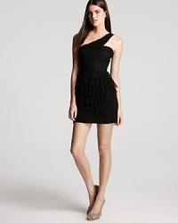 With dramatic ruffling, this BCBGMAXAZRIA one shoulder dress makes a glamorous entrance. With dramatic ruffling, this BCBGMAXAZRIA one shoulder dress makes a glamorous entrance.