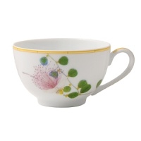 Adapted from botanical drawings of gardens in Mumbai, India, where an abundance of rare plant species grow, precisely detailed floral and vegetal illustrations adorn this fine porcelain tea cup from Bernardaud. It's edged with a rattan trompe l'oeil pattern reminiscent of popular Indian furniture designs Adapted from botanical drawings of gardens in Mumbai, India, where an abundance of rare plant species grow, precisely detailed floral and vegetal illustrations adorn this fine porcelain tea cup from Bernardaud. It's edged with a rattan trompe l'oeil pattern reminiscent of popular Indian furniture designs