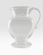 A simply stunning glass pitcher marries a traditional silhouette with a spiraled sphere ground. Extraordinary thread and berry detail creates all the interest and charm of an heirloom classic. 76 oz. capacity 9½H X 7½ diam. Dishwasher safe Imported 