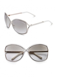 Metal crossover butterfly shaped frame enhanced with enamel insert. Available in shiny rose gold with ivory enamel and bronze mirror lens.100% UV protection Made in Italy 