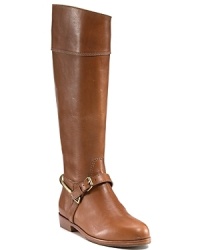 Sleek leather, finished with equestrian-inspired straps and gleaming buckles, forms a well-bred take on the riding boot trend. By Pour La Victoire. Sleek leather, finished with equestrian-inspired straps and gleaming buckles, forms a well-bred take on the riding boot trend. By Pour La Victoire.