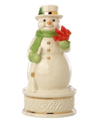 Wishing you a merry Christmas, this porcelain snowman figurine fills your home with song and spirit year after year. Featuring gold buttons, carved accents and a cheery red cardinal in Lenox porcelain. Plays We Wish You a Merry Christmas. Wishing you a merry Christmas, this porcelain snowman figurine fills your home with song and spirit year after year. Featuring gold buttons, carved accents and a cheery red cardinal in Lenox porcelain. Plays We Wish You a Merry Christmas.