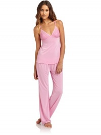 THE LOOKV-neckAdjustable strapsLace bodiceEmpire waistElastic waistWide leg silhouetteTHE FITTop: about 25 from shoulder to hemPants: rise, about 10; inseam, about 31THE MATERIAL83% polyester/17% spandexCARE & ORIGINMachine washImportedModel shown is 5'10 (177cm) wearing US size Small. THE LOOKV-neckAdjustable strapsLace bodiceEmpire waistElastic waistWide leg silhouetteTHE FITTop: about 25 from shoulder to hemPants: rise, about 10; inseam, about 31THE MATERIAL83% polyester/17% spandexCARE & ORIGINMachine washImportedModel shown is 5'10 (177cm) wearing US size Small.