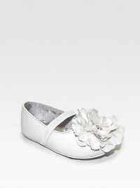 Fluttery fabric flowers with sparkly rhinestones adorn shiny slip-ons with easy stretch straps.Patent-look upper Elasticized stretch strap Skid-resistant rubber sole Man-made Imported Fluttery fabric flowers with sparkly rhinestones adorn shiny slip-ons with easy stretch straps.Patent-look upper Elasticized stretch strap Skid-resistant rubber sole Man-made Imported