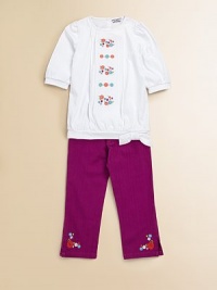 A charming short-sleeved top in soft cotton is accented with a blooming bouquet of embroidered flowers to inspire warm thoughts.Round necklineShort puff sleevesBack button closureTie hemCottonMachine washImported Please note: Number of buttons may vary depending on size ordered. A charming short-sleeved top in soft cotton is accented with a blooming bouquet of embroidered flowers to inspire warm thoughts.Round necklineShort puff sleevesBack button closureTie hemCottonMachine washImported Please note: Number of buttons may vary depending on size ordered.