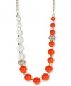 Sunny days call for bright colors. Orange beads are complemented by stunning crystal fireball accents, clear beads and gold tone spacers on Haskell's long necklace. Set in gold tone mixed metal. Approximate length: 35 inches. Approximate drop: 1/10 inch.