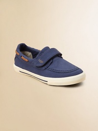 An easy combination of a boat shoe and a sneaker, with slip on ease and a cozy shearling lining.Suede upper Wide grip-tape strap EVA insole with sheepskin lining Vulcanized no-scuff rubber sole Imported An easy combination of a boat shoe and a sneaker, with slip on ease and a cozy shearling lining.Suede upper Wide grip-tape strap EVA insole with sheepskin lining Vulcanized no-scuff rubber sole Imported