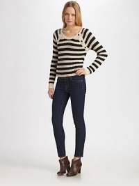 Surrounded by bold stripes, this fitted cotton scoopneck has long dolman sleeves and asymmetrical button closures at the left shoulder. Ribbed scoopneckAsymmetrical button closures at shoulderLong sleevesCottonHand washImportedModel shown is 5'10 (177cm) wearing US size small. Surrounded by bold stripes, this fitted cotton scoopneck has long dolman sleeves and asymmetrical button closures at the left shoulder. Ribbed scoopneckAsymmetrical button closures at shoulderLong sleevesCottonHand washImportedModel shown is 5'10 (177cm) wearing US size small.