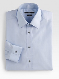 A fitted look for every dress occasion in smooth, finely woven cotton. Buttonfront Moderate spread collar Cotton Dry clean Made in Italy A fitted look for every dress occasion in smooth, finely woven cotton. Buttonfront Moderate spread collar Cotton Dry clean Made in Italy