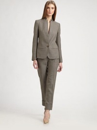 This sharp, menswear-inspired design features crisp, inverted lapels, and is rendered in finespun wool.Inverted peaked lapelsButton closureWelt pocketsButton cuffsAbout 24 from shoulder to hemWoolDry cleanMade in Italy of imported fabricModel shown is 5'10 (177cm) wearing US size 4. This sharp, menswear-inspired design features crisp, inverted lapels, and is rendered in finespun wool.Inverted peaked lapelsButton closureWelt pocketsButton cuffsAbout 24 from shoulder to hemWoolDry cleanMade in Italy of imported fabricModel shown is 5'10 (177cm) wearing US size 4.