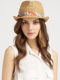 Classic structure and hand-woven straw gets colorful with a contrasting fabric band.Paper strawFabric band: 75% cotton/25% silkSnap brim, about 2Imported