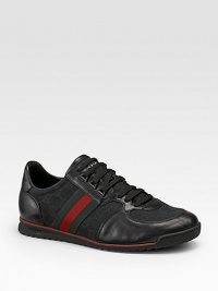 Lace-up design with signature web and Gucci label on the tongue. Rubber sole Made in Italy Please note: For best fit please size down one full size. Lace-up design with signature web and Gucci label on the tongue. Rubber sole Made in Italy Please note: For best fit please size down one full size.