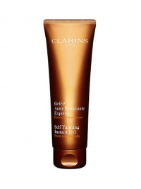 Named Best Self-Tanner in Allure magazine's Best of Beauty. Self Tanning Instant Gel. Achieve an even, golden, natural-looking tan for face and body without the harmful effects of the sun. Lightweight non-oily formula absorbs easily, providing effective results in just two hours while also helping to preserve skin's youthful appearance by promoting visibly more beautiful skin. Ideal for those who wish to maintain a year-round tanned appearance. 4.4 oz. Imported from France. Named Best Self-Tanner in Allure magazine's Best of Beauty. Self Tanning Instant Gel. Achieve an even, golden, natural-looking tan for face and body without the harmful effects of the sun. Lightweight non-oily formula absorbs easily, providing effective results in just two hours while also helping to preserve skin's youthful appearance by promoting visibly more beautiful skin. Ideal for those who wish to maintain a year-round tanned appearance. 4.4 oz. Imported from France.
