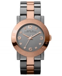 Flaunting signature style, this Marc by Marc Jacobs watch adds glamour to the workday. Flaunting signature style, this Marc by Marc Jacobs watch adds glamour to the workday.