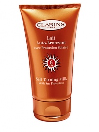 Self Tanning Milk with Sun Protection, SPF 6. Perfect for those who want a healthy golden tan, with or without the sun. The fluid, lightweight, milky formula helps achieve an even, natural-looking tan within approximately two hours of application. Safeguards skin with reinforced SPF 6 sun protection. Moisturizes skin to help prevent dehydration and preserve its youthful beauty. Ideal for face and body. 4.4 oz. Imported from France. Self Tanning Milk with Sun Protection, SPF 6. Perfect for those who want a healthy golden tan, with or without the sun. The fluid, lightweight, milky formula helps achieve an even, natural-looking tan within approximately two hours of application. Safeguards skin with reinforced SPF 6 sun protection. Moisturizes skin to help prevent dehydration and preserve its youthful beauty. Ideal for face and body. 4.4 oz. Imported from France.