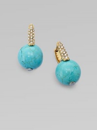 Smooth balls of bold turquoise accented with rhinestone encrusted hinged posts. TurquoiseGlass stonesGoldtone steelLength, about ¾Hinge-and-post backImported Smooth balls of bold turquoise accented with rhinestone encrusted hinged posts. TurquoiseGlass stonesGoldtone steelLength, about ¾Hinge-and-post backImported