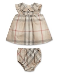 First impression! Burberry's signature check dress guarantees style from the start. First impression! Burberry's signature check dress guarantees style from the start.